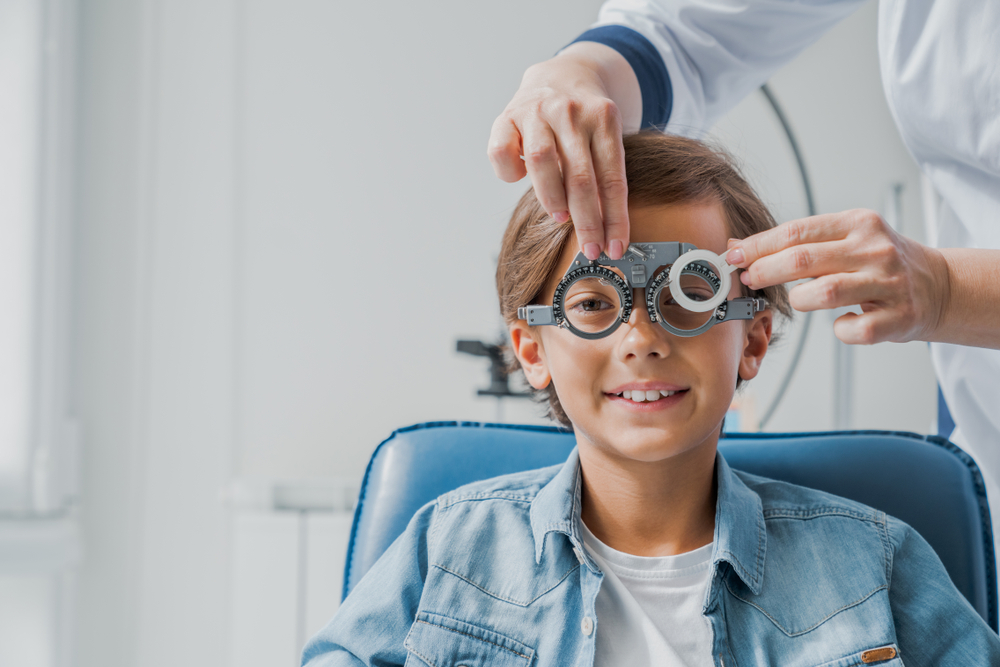 Smiling,Child,Boy,In,Glasses,Checks,Eye,Vision,At,Pediatric