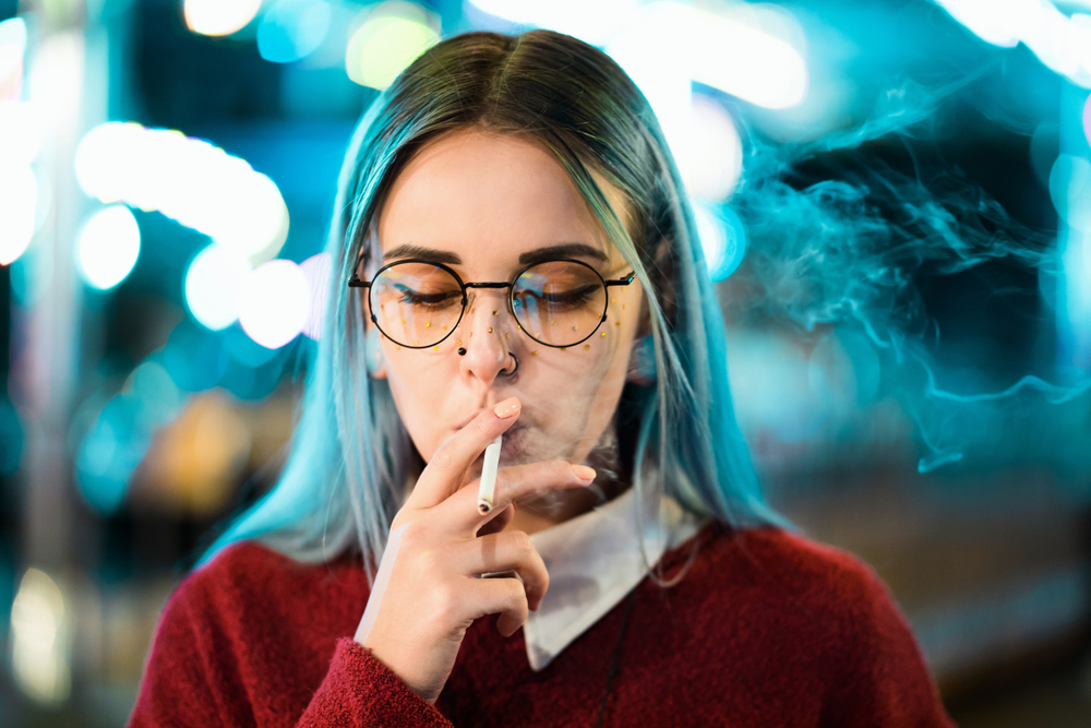 Millennial,Pretty,Girl,With,Unusual,Dyed,Hairstyle,Smoking,Cigarette,In