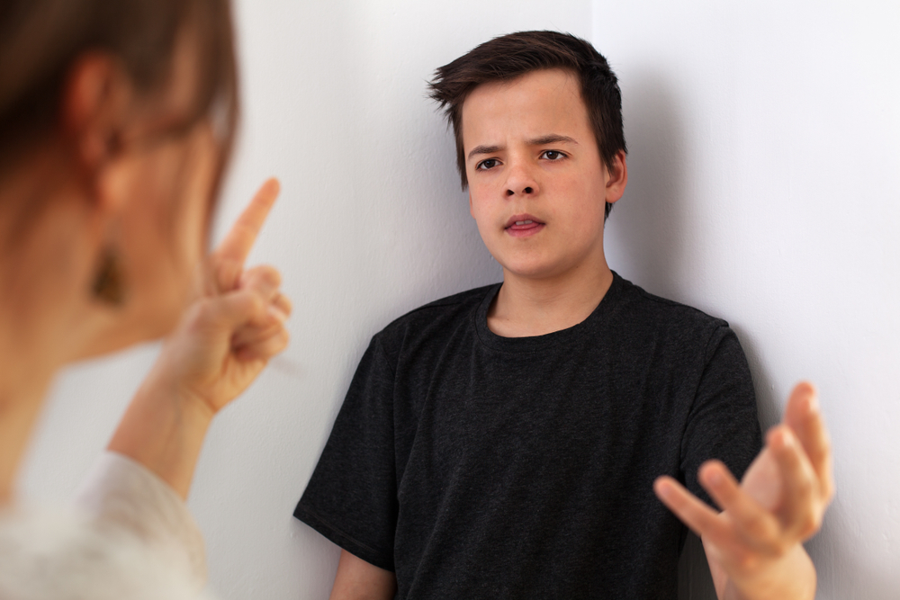 Woman,And,Her,Teenager,Son,Having,A,Quarrel,-,Gesturing