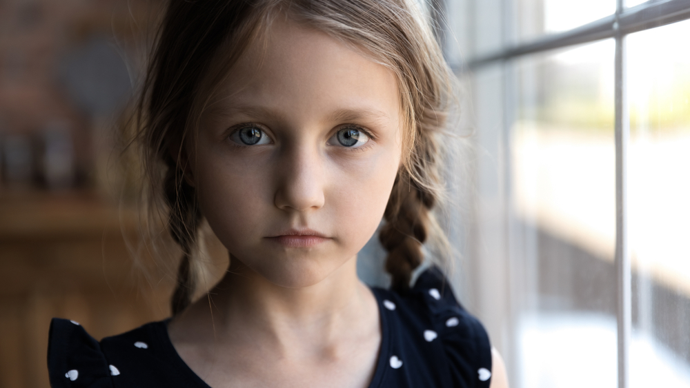 Crop,Close,Up,Portrait,Of,Serious,Sad,Little,Caucasian,Girl