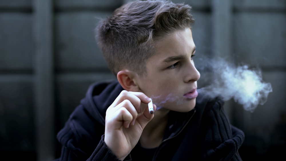 Teenager,Boy,Smoking,Cigarette,,Harmful,Addiction,,Pretending,To,Be,Cool