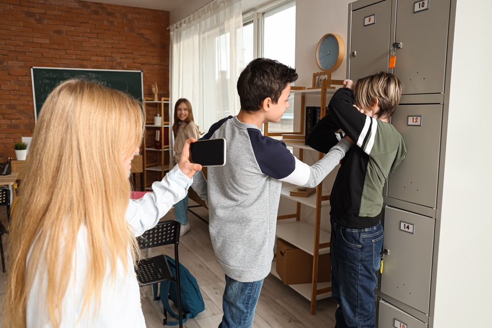 Little,Boy,Bullying,His,Classmate,At,School